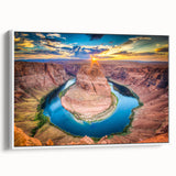 Vintage poster art of the Grand Canyon in colorful hues on a framed canvas, ideal for living room decor.