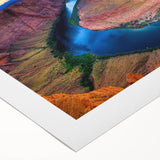 Art deco poster of Horseshoe Bend with muted earth tones on rolled canvas, suitable for dining room decor.