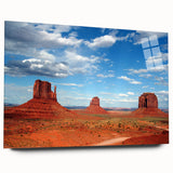 Acrylic print of Monument Valley with vivid orange and red tones, suitable for bedroom or dining room decor.