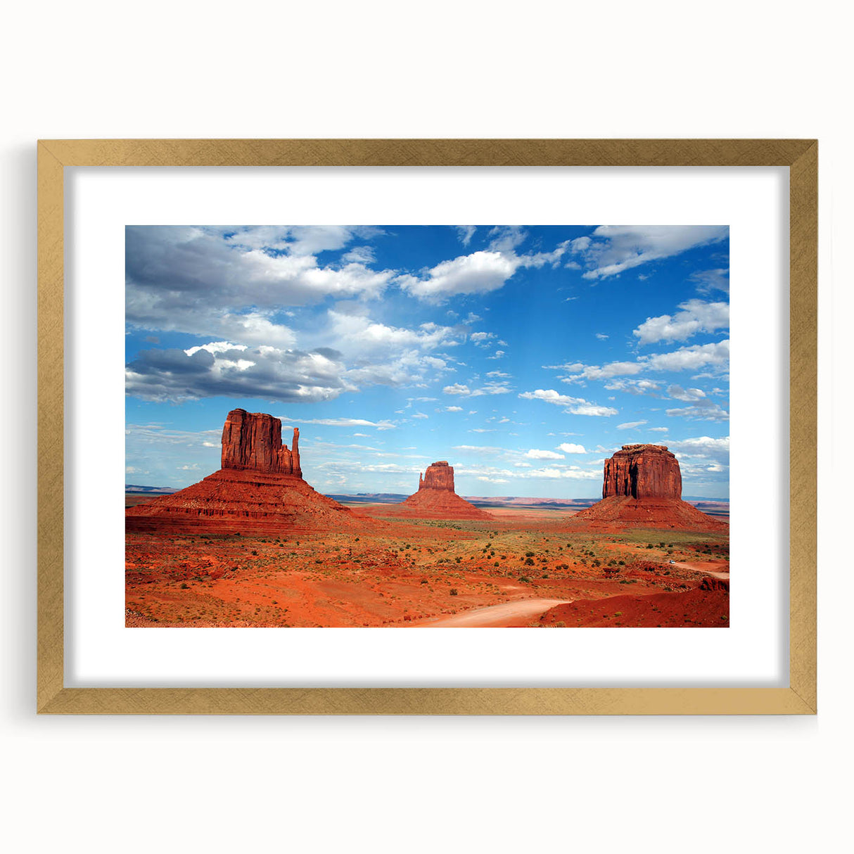 Extra large textured art print of Monument Valley in Arizona with abstract elements, framed in gold.
