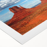 Art deco poster of Monument Valley in earthy tones on a rolled canvas, suitable for dining room décor.