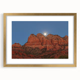 Extra large abstract art print of Sedona landscape, featuring textured red and orange hues, framed in gold.