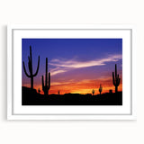 Abstract art print of Sonoran Desert with muted earth tones on a framed white mat, ideal for dining room decor.
