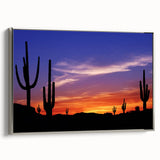 Framed canvas landscape art painting depicting the Sonoran Desert in Arizona with a vintage poster style and a silver frame.