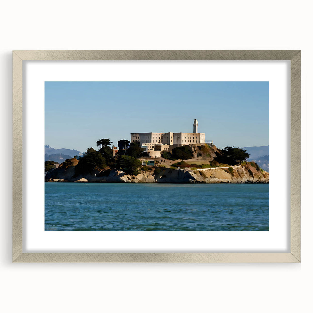 Textured art print of Alcatraz in muted gray tones, framed in silver, ideal for bedroom art.