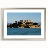 Textured art print of Alcatraz in muted gray tones, framed in silver, ideal for bedroom art.