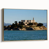 Framed canvas wall art featuring a vintage-style landscape of Alcatraz Island in black and gold tones.