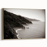 Framed canvas wall art featuring a vintage-style landscape of Big Sur, California in muted gold and black tones.