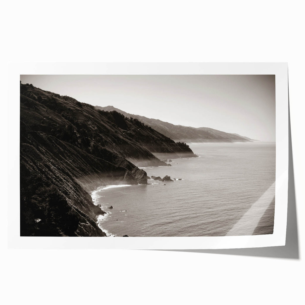 Rolled print of Big Sur coastline with muted blue and green tones, ideal for art wall dining room.
