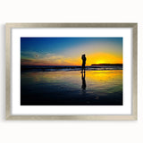 Textured abstract art print of California scenery in muted earth tones on a framed silver mat, suitable for bedroom decor.