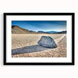 Abstract art print of Death Valley in vibrant, colorful hues on a textured, extra large canvas, framed in black.
