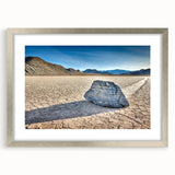 Textured art print of Death Valley in muted earth tones on a silver-framed canvas, suitable for bedroom decor.
