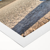 Art deco poster of Death Valley in muted earth tones on rolled canvas, suitable for dining room decor.