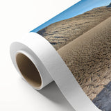 Art deco poster of Death Valley landscape on rolled canvas, featuring muted earth tones, ideal for dining room wall art.