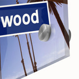 Mid-century modernist acrylic print of abstract Hollywood, California scenery in muted earth tones.