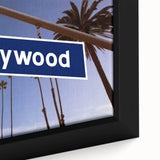 Extra large framed canvas of a textured Hollywood, California scenery in black with colorful accents.