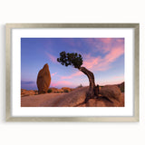 Textured art print of Joshua Tree in muted earth tones on a framed canvas, suitable for bedroom decor.