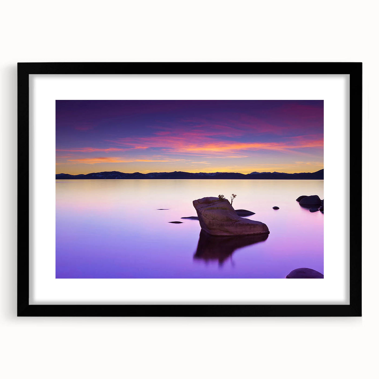 Abstract art print of Lake Tahoe in vibrant colors on a textured, extra large canvas, framed in black.