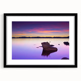 Abstract art print of Lake Tahoe in vibrant colors on a textured, extra large canvas, framed in black.