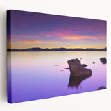 Panoramic view of Lake Tahoe on a stretched canvas, featuring muted blue and green tones, ideal for kitchen wall art.