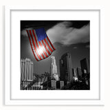 Abstract art print of Los Angeles skyline in muted grays and blues, framed with a white mat.