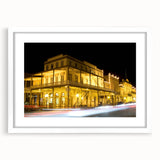 Abstract art print of Sacramento scenery in muted earth tones on a white framed mat, suitable for dining room decor.