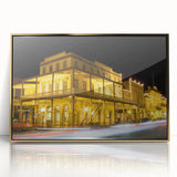 Mid-century modernist art of Sacramento skyline in gold and teal hues on framed acrylic, ideal for modern art wall decor.