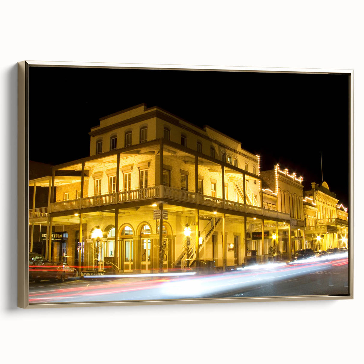 Framed canvas of Sacramento landscape with vintage poster style, featuring muted gold and black tones.