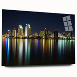 Large abstract art print of San Diego scenery in muted blue and orange tones on acrylic glass.