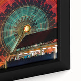 Extra large framed canvas depicting a textured Santa Monica scenery in black with colorful art accents.