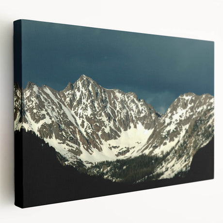 Side view of a stretched canvas featuring a landscape scene of Vail, Colorado in muted earth tones.