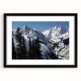 Extra large abstract art print of Aspen scenery in vibrant colors on a textured canvas, framed in black.