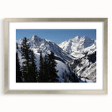 Textured abstract art print of Aspen, Colorado in muted earth tones on a framed silver mat, ideal for bedroom decor.