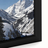 Close-up of a textured, extra large framed canvas depicting a black Aspen, Colorado scenery with colorful art accents.