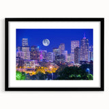 Extra large abstract art print of colorful, textured Denver skyline on framed black canvas, ideal for living room decor.
