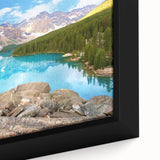 Framed canvas of the Colorado Rocky Mountains, featuring a textured black foreground with colorful sky.