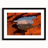 Extra large abstract art print of Colorado Springs in vibrant colors on a textured canvas, framed in black.