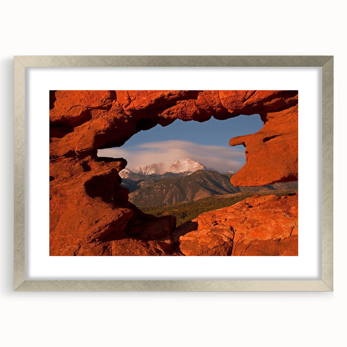 Textured art of abstract Colorado Springs scenery in muted earth tones on a framed silver mat, ideal for bedroom decor.