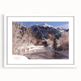 Abstract art print of Telluride, Colorado in muted earth tones on a framed white mat, ideal for dining room decor.
