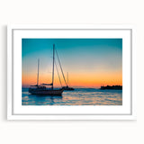 Abstract art print of Florida Keys scenery in muted blue and green tones on a framed white mat.