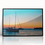 Large abstract wall art depicting the Florida Keys in muted oceanic blues and greens, framed in black acrylic.