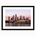 Extra large abstract art print of colorful, textured Tampa scenery on a black framed mat, ideal for living room decor.