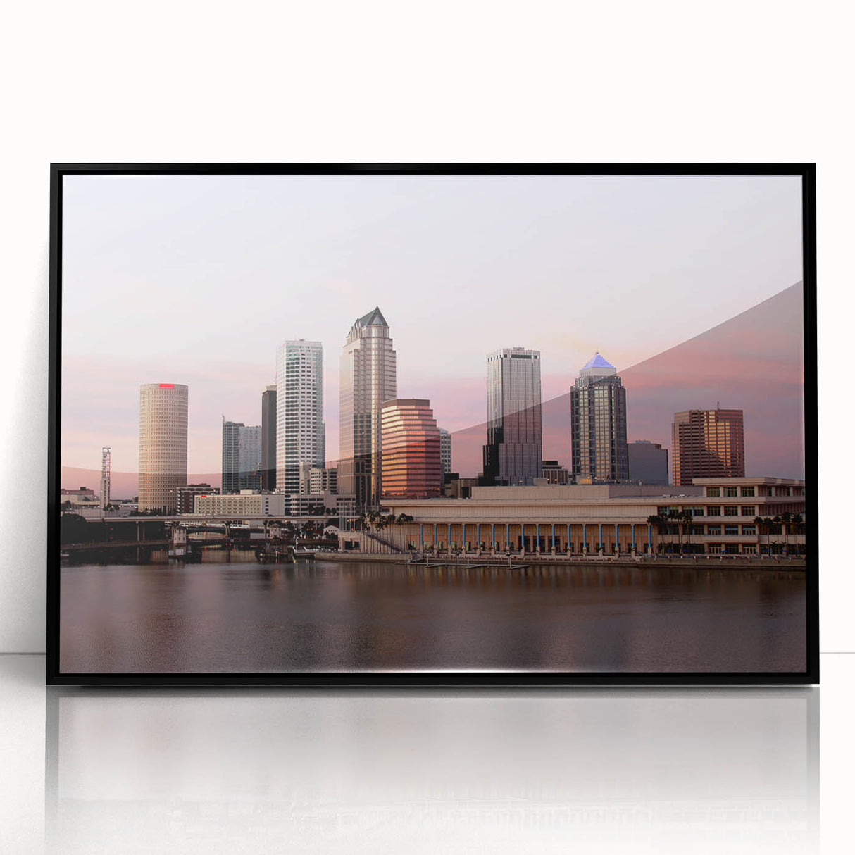 Large abstract wall art depicting the Tampa skyline in muted gray and blue tones, framed in black acrylic.