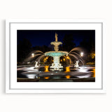 Abstract art print of Savannah scenery in muted green and blue tones, framed with a white mat.