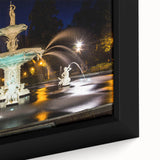 Close-up of a textured black wall art depicting Savannah's scenery on a framed canvas, featuring colorful accents.