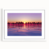 Abstract art print of Maui landscape in subdued blue and green tones on a white matted frame, suitable for dining room decor.