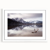 Abstract art print of an Idaho landscape in muted earth tones on a white matted frame, suitable for dining room decor.