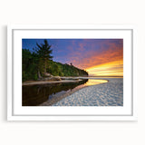 Abstract art print of Lake Michigan, featuring cool blue and gray tones on a white-framed canvas.