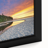 Black wall art featuring a textured depiction of Lake Michigan, with vibrant color accents on a framed canvas.