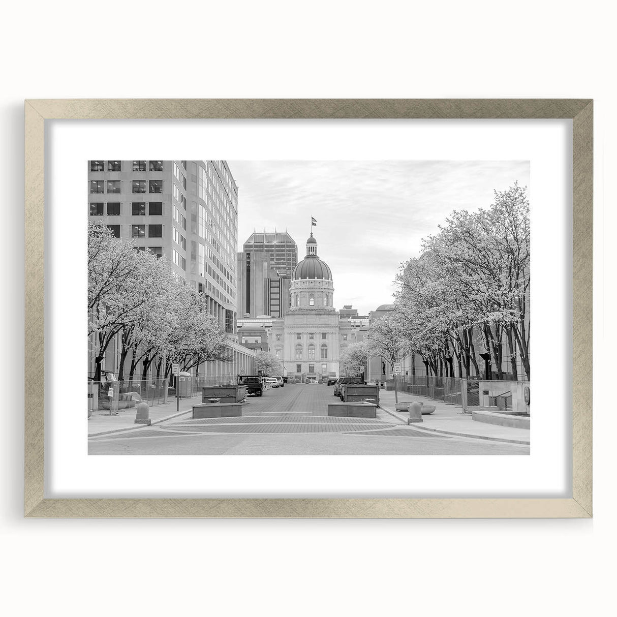 Textured abstract art print of Indianapolis skyline in muted silver and gray tones on a framed canvas.